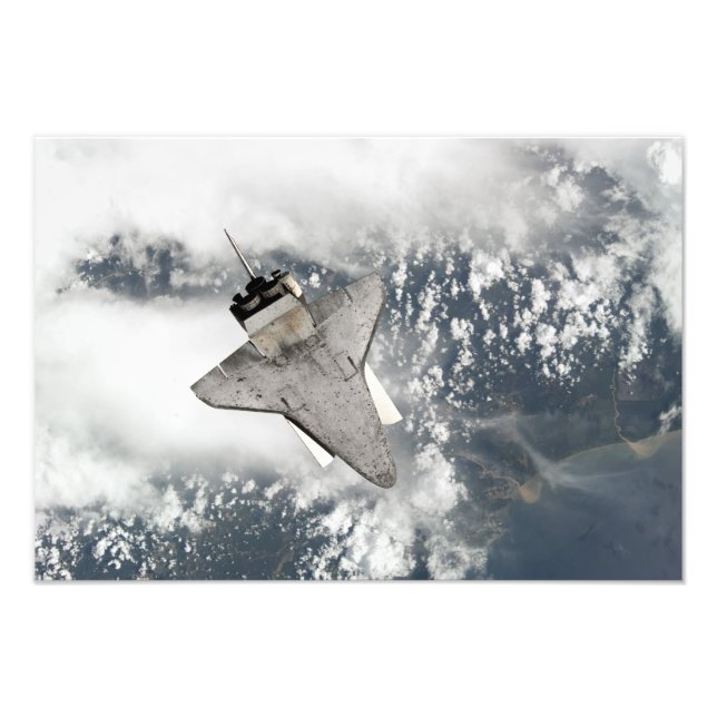 The underside of space shuttle Discovery Photo Print (Front)