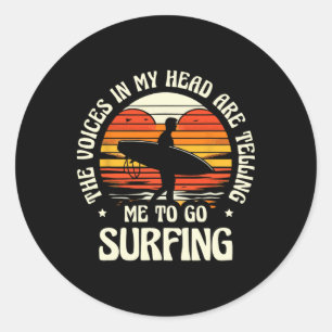 The Voices In My Head Are Telling Me To Go Surfing Classic Round Sticker