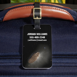 The Wayward Interstellar Object Oumuamua. Luggage Tag