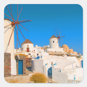 The white buildings and the windmills on the square sticker