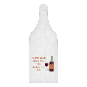 The Wind Rescuer Setting Wine Free on a Cutting Board