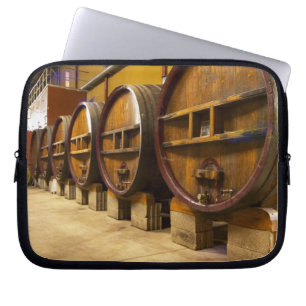 The wine cellar winery with big old wooden casks laptop sleeve