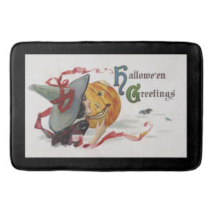 The Witch's Kiss: a Jack o Lantern on Halloween Bath Mat