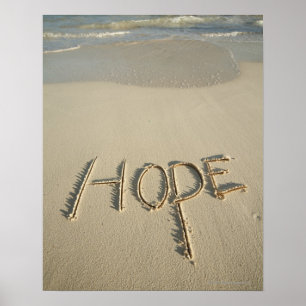 The word 'Hope' sand written on the beach with Poster