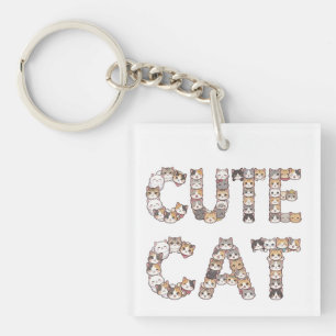 The words "CUTE CAT" are made using cat faces Key Ring