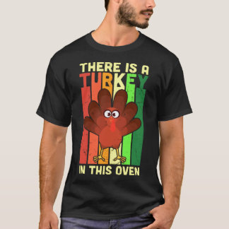 THEIR IS A TURKEY IN THE OVEN 1 T-Shirt