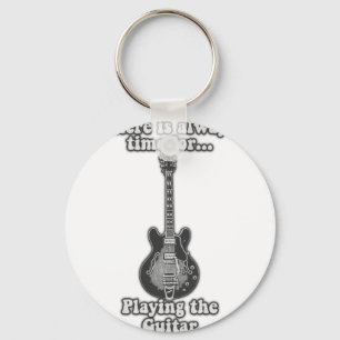 There is always time for playing the guitar. B&W Key Ring