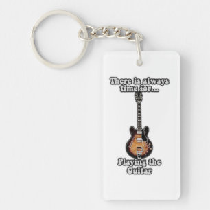 There is always time for playing the guitar. retro key ring