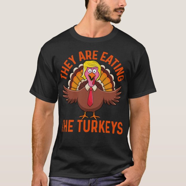 They Are Eating The Turkeys Thanksgiving Humor by  T-Shirt (Front)