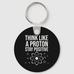 Think like a proton stay positive key ring