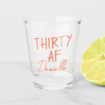 THIRTY AF Personalised Funny 30th Birthday Shot Glass<br><div class="desc">Kick off turning 30 with a toast you won’t forget. This bold “THIRTY AF” shot glass features vibrant orange text and your custom name in a chic script font — the perfect combo of playful and personal. Ideal for birthday parties, brunches, bachelorette weekends, or gifting your bestie something she’ll actually...</div>