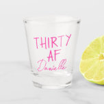 THIRTY AF Personalised Funny 30th Birthday Shot Glass<br><div class="desc">Kick off turning 30 with a toast you won’t forget. This bold “THIRTY AF” shot glass features vibrant pink text and your custom name in a chic script font — the perfect combo of playful and personal. Ideal for birthday parties, brunches, bachelorette weekends, or gifting your bestie something she’ll actually...</div>