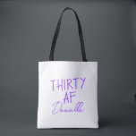 THIRTY AF Personalised Funny 30th Birthday Tote Bag<br><div class="desc">Celebrate turning 30 in bold style with this personalised “THIRTY AF” tote bag. Featuring vibrant purple text and your custom name in elegant script, this playful yet practical bag is perfect for birthday brunches, party essentials, or gift-giving flair. Whether you’re treating yourself or surprising your bestie, this tote adds sass...</div>