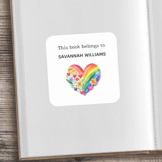 This Book Belongs To Bookplate Rainbow Heart Kids Square Sticker (A custom bookplate sticker with rainbow heart and flowers design and 'This book belongs to' words)