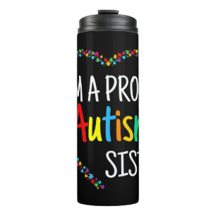 This colourful autism heart made with puzzle piece thermal tumbler