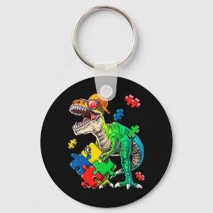 This dinosaur autism awareness top features a dino key ring
