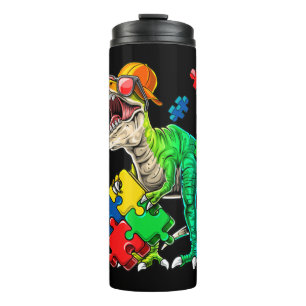 This dinosaur autism awareness top features a dino thermal tumbler