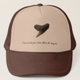 This is not a shark's tooth. trucker hat