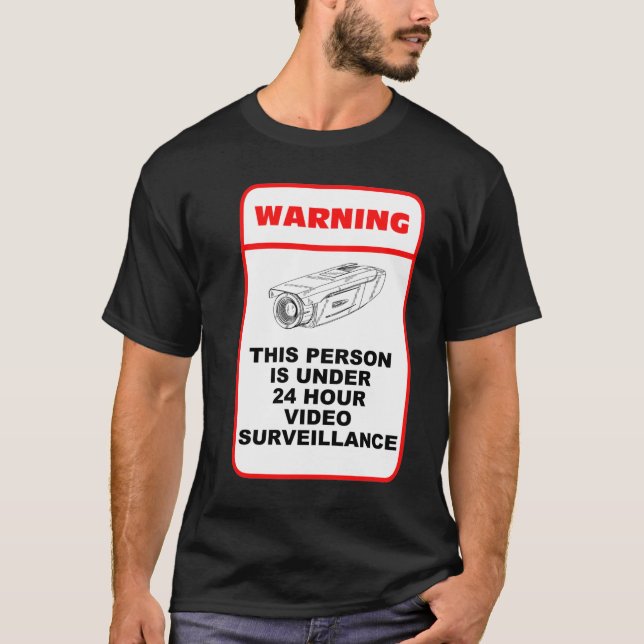 This person is under 24 hour video surveillance T-Shirt (Front)