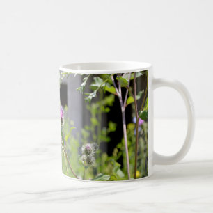 Thistles in front of ruins coffee mug