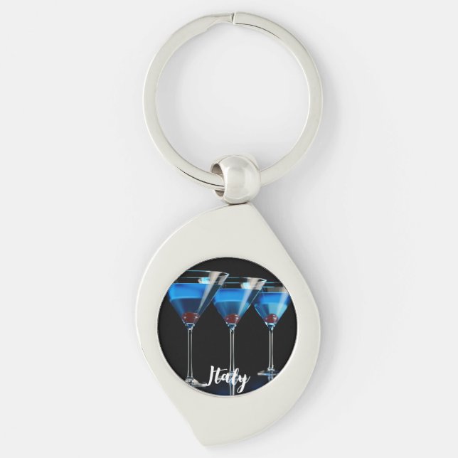 Three blue cocktails with cherry on black key ring (Front)
