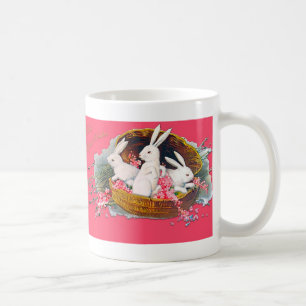 Three bunnies in a basket mug
