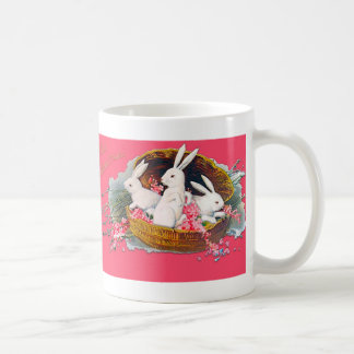 Three bunnies in a basket mug