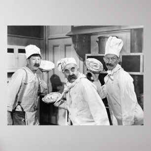 Three chefs holding pies for a fight in the kitche poster