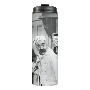 Three chefs holding pies for a fight in the kitche thermal tumbler