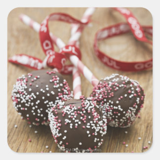 Three chocolate lollipops square sticker