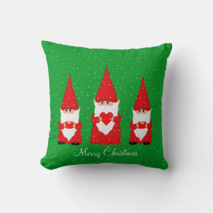 Three Christmas Gnomes on Green Cushion