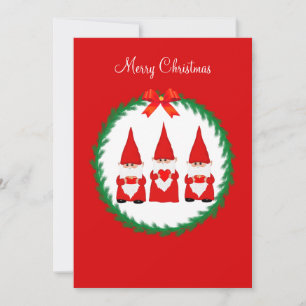 Three Christmas gnomes on red