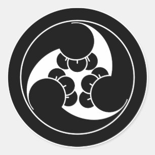 Three clockwise clove swirls in circle classic round sticker