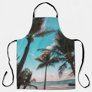 Three coconut trees on seashore apron