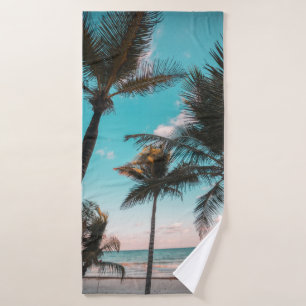 Three coconut trees on seashore bath towel