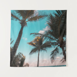 Three coconut trees on seashore tapestry