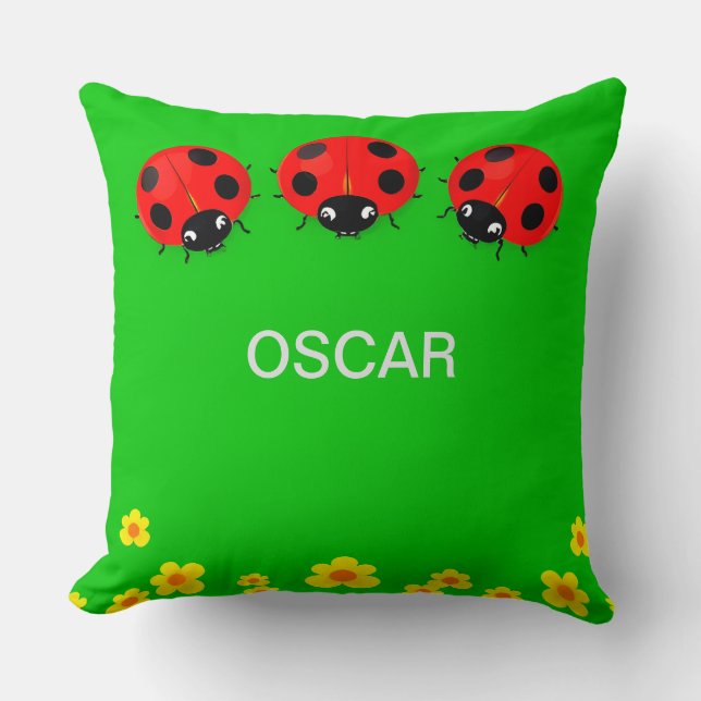 Three Colourful Ladybugs on Green Background Cushion (Front)