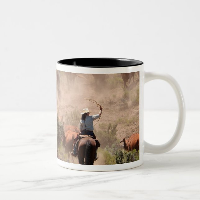 Three cowboys and cowgirls driving cattle Two-Tone coffee mug (Right)
