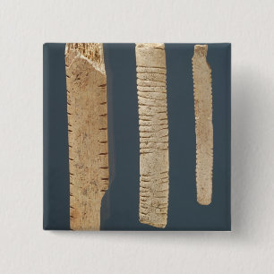 Three decorated bones 15 cm square badge
