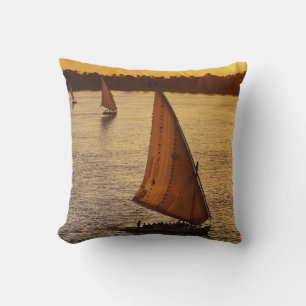 Three falukas with sightseers on Nile River at Cushion