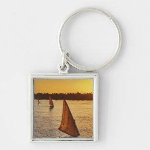 Three falukas with sightseers on Nile River at Key Ring