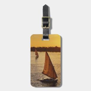 Three falukas with sightseers on Nile River at Luggage Tag