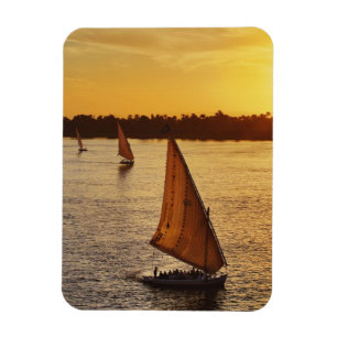 Three falukas with sightseers on Nile River at Magnet