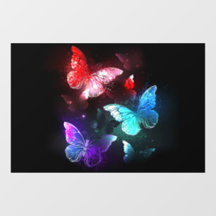 Three Glowing Butterflies on night background