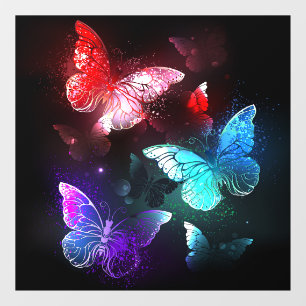 Three Glowing Butterflies on night background