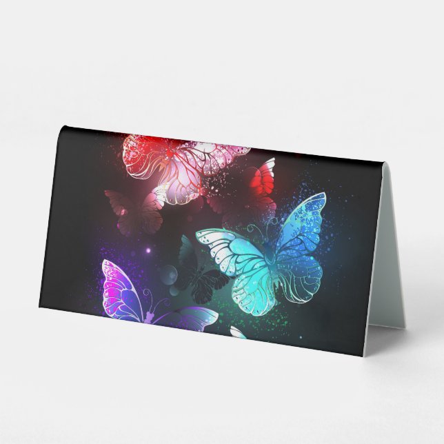 Three Glowing Butterflies on night background (Front)