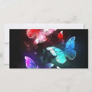 Three Glowing Butterflies on night background Card
