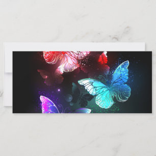 Three Glowing Butterflies on night background Card
