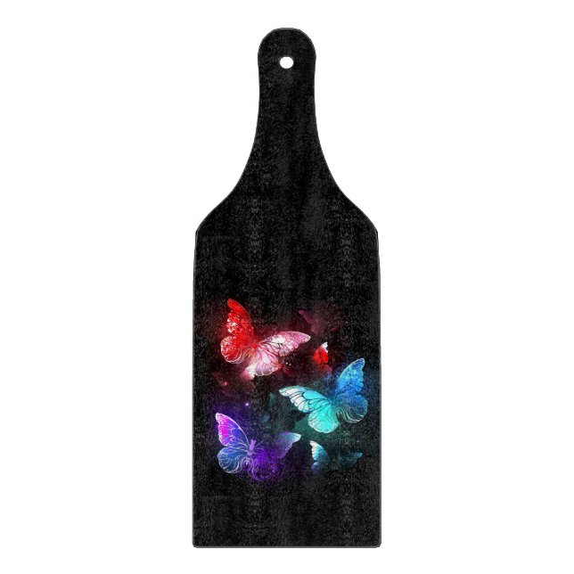 Three Glowing Butterflies on night background Cutting Board (Front)