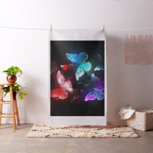 Three Glowing Butterflies on night background Fabric